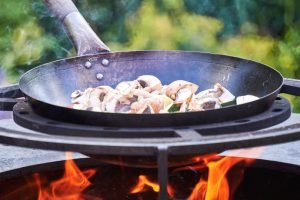 Read more about the article Cast Iron Vs Carbon Steel Wok | Side by Side Comparison